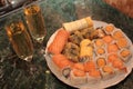A romantic dinner , champagne glasses and sushi Royalty Free Stock Photo