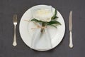 Romantic dinner. Elegance table setting with white peony on linen tablecloth. Top view Royalty Free Stock Photo