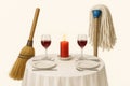A romantic dinner of mops and a broom. Royalty Free Stock Photo