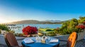 Romantic dinner place with idyllic view of coastscape at sunset