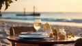 Romantic dinner setting on the beach at sunset Royalty Free Stock Photo