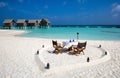 Romantic dinner setup on Maldivian beach Royalty Free Stock Photo