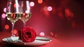 Romantic dinner setup with rose and wine glasses Royalty Free Stock Photo