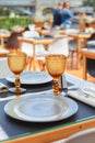 A romantic dinner in the summer on the deck of the ship at the bottom m with two glasses of white wine and a wine Royalty Free Stock Photo