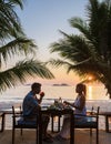 Romantic dinner during sunset on a tropical beach in Thailand, Koh Chang island Royalty Free Stock Photo