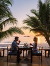 Romantic dinner during sunset on a tropical beach in Thailand, Koh Chang island Royalty Free Stock Photo