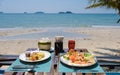 Romantic dinner during sunset on a tropical beach in Thailand, Koh Chang island Royalty Free Stock Photo