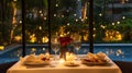 Romantic Dinner Table Setting with Pool and String Lights View Royalty Free Stock Photo