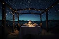 romantic dinner for two, with candlelight and starry sky overhead Royalty Free Stock Photo