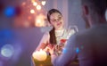 Romantic dinner. Young couple toasting wine glass in restaurant