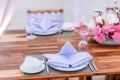 Romantic dinning table on the beach . Table setting at a luxury wedding and Beautiful flowers on the table. Royalty Free Stock Photo