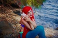 Romantic dreamer girl in mermaid costume on sea side