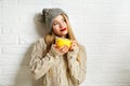 Romantic Dreaming Winter Hipster Girl with a Mug