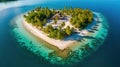 Romantic and dreamy heart-shaped island in the middle of the ocean. Island covered with green palm trees and colorful flowers. Royalty Free Stock Photo