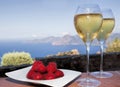 Romantic drink in corsica with strawberries and white wine Royalty Free Stock Photo