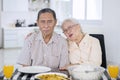 Romantic elderly couple having a meal together