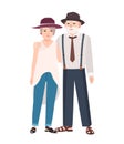 Romantic elderly couple. Pair of old cute man and woman wearing hats standing together and embracing. Grandma and