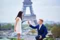 Romantic engagement in Paris Royalty Free Stock Photo