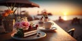 romantic resort relaxing sunset beach cafe ,cup of coffee ,glass of wine,weet cake and flowers on table Royalty Free Stock Photo