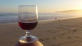 Romantic evening mood at the sea with a glass of red wine.