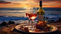 romantic evening with two glasses of wine on the beach. sunset. Royalty Free Stock Photo