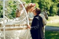 Romantic fairy-tale wedding couple bride and groom kissing in ma Royalty Free Stock Photo