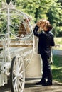 Romantic fairy-tale wedding couple bride and groom kissing in ma Royalty Free Stock Photo