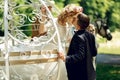 Romantic fairy-tale wedding couple bride and groom kissing in ma Royalty Free Stock Photo