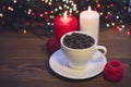 Still life with a coffee cup and candles