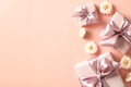 Romantic flat lay composition with gifts and roses flowers on beige desk table. Valentines Day background