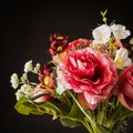 Romantic Flowers Bouquet close up isolated on black background, photo to oil painting effect