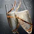 Romantic flutes of sparkling golden champagne Royalty Free Stock Photo