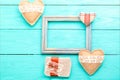 Romantic frame with copy space and accessories on blue wooden Royalty Free Stock Photo