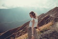 Romantic free young woman with hair wind enjoy harmony with nature and fresh air. Peace of mind. Happy tranquil girl, inspiration Royalty Free Stock Photo