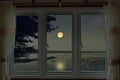 Romantic full moon night in window view Royalty Free Stock Photo