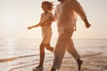 romantic getaway travel, happy couple on the beach having fun, honeymoon Royalty Free Stock Photo