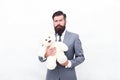 Romantic gift. Man wear tuxedo tie hold soft toy. International womens day. Surprise will melt her heart. Romantic teddy