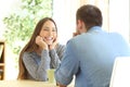 Romantic girl falling in love in a first date Royalty Free Stock Photo