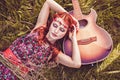 Romantic girl and her guitar, summer, hippie style Royalty Free Stock Photo