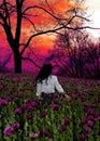 romantic girls in a field with purple poppies