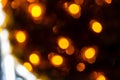 Romantic golden abstract bokeh with black background