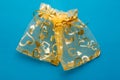 Romantic golden gift bags
