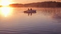 Romantic golden sunset river lake fog loving couple small rowing boat Romantic date beautiful Lovers ride boat during beautiful su Royalty Free Stock Photo