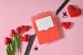 Romantic Halloween with a red kraft envelope, tulips and spiders. Happy Halloween Royalty Free Stock Photo