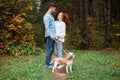 Romantic happy cheerful couple looking at each other spending time in the forest Royalty Free Stock Photo