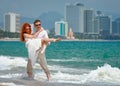 Romantic happy couple on the beach. Royalty Free Stock Photo