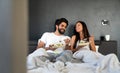 Romantic happy couple in love having breakfast in bed Royalty Free Stock Photo