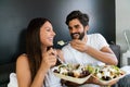 Romantic happy couple in love having breakfast in bed Royalty Free Stock Photo