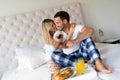 Romantic happy couple having breakfast in bed Royalty Free Stock Photo