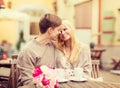 Romantic happy couple kissing in the cafe Royalty Free Stock Photo